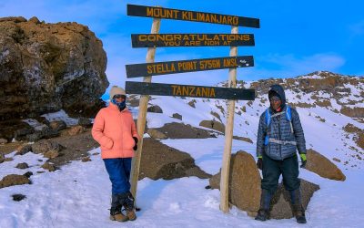 Angelina William and Joseph at Stella Point, Kilimanjaro—A trek with Rejoice Africa Tour
